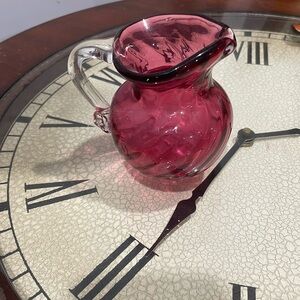 Small vintage cranberry hand blown pitcher